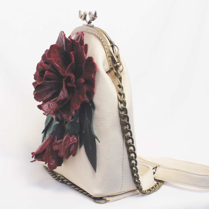 Leather handbag with burgundy flower